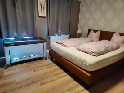 Ein Bett oder Betten in einem Zimmer der Unterkunft Ferienhaus am Sauerbrunnen