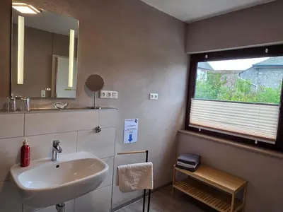 Ein Badezimmer in der Unterkunft FeWo Algenrodt