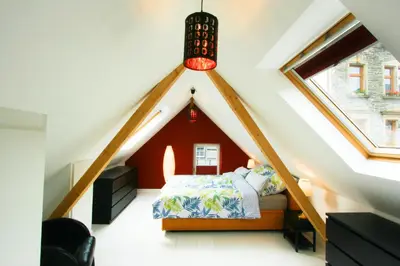 Ein Bett oder Betten in einem Zimmer der Unterkunft Ferienhaus Atelier