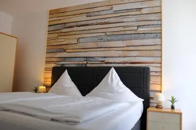 Ein Bett oder Betten in einem Zimmer der Unterkunft Hotel St. Georg