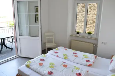 Ein Bett oder Betten in einem Zimmer der Unterkunft Weingut Mathy-Schanz