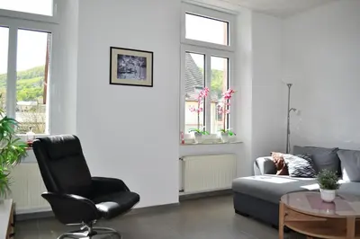 Ein Sitzbereich in der Unterkunft Weingut Mathy-Schanz