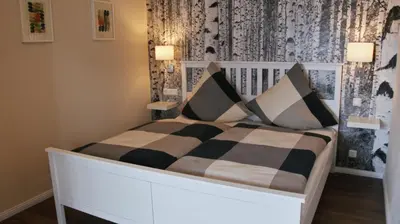 Ein Bett oder Betten in einem Zimmer der Unterkunft Ferienwohnung Seestern