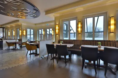 Ein Sitzbereich in der Unterkunft M13 Hotel