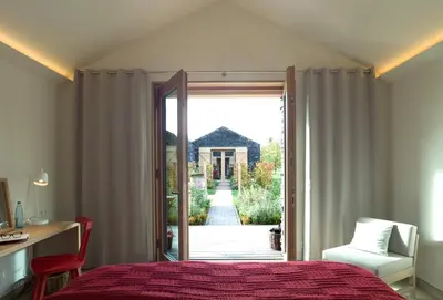 Ein Bett oder Betten in einem Zimmer der Unterkunft WeinKulturgut Longen-Schlöder
