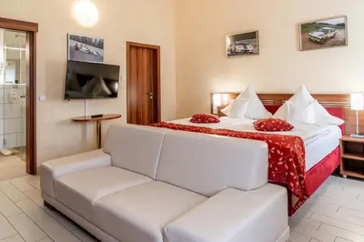 Ein Bett oder Betten in einem Zimmer der Unterkunft Land-gut-Hotel am Ring