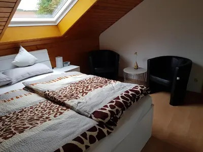 Ein Bett oder Betten in einem Zimmer der Unterkunft Ferienwohnung Hedi