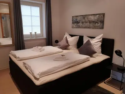 Ein Bett oder Betten in einem Zimmer der Unterkunft Mosel Ferienhaus Reblaus