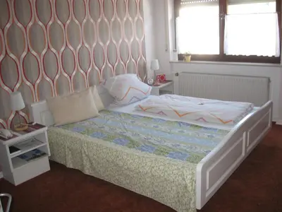 Ein Bett oder Betten in einem Zimmer der Unterkunft Pension Haus Ursula