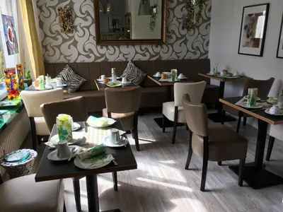 Ein Sitzbereich in der Unterkunft Gaestehaus Klaus
