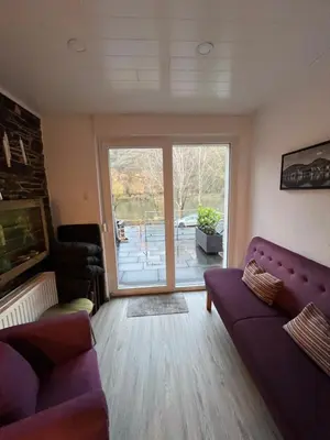 Ein Sitzbereich in der Unterkunft Haus Osterlämmchen