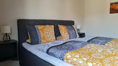 Ein Bett oder Betten in einem Zimmer der Unterkunft Weingut Markus Busch