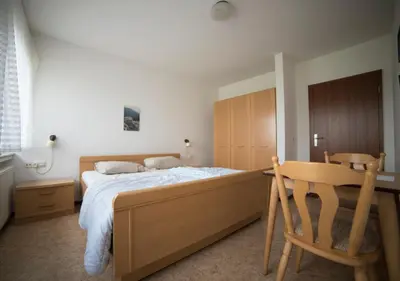Ein Bett oder Betten in einem Zimmer der Unterkunft Ferienhaus Vulkaneifel Kopp