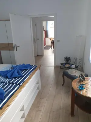 Ein Bett oder Betten in einem Zimmer der Unterkunft Marumparkblick