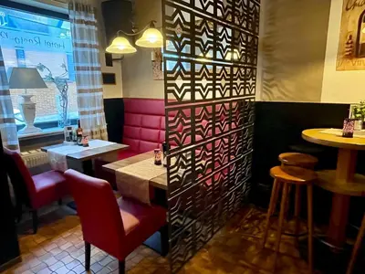 Ein Sitzbereich in der Unterkunft Hotel Zur Dorfschänke