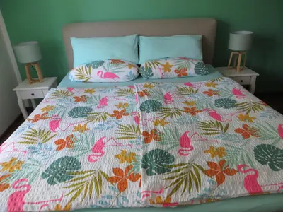 Ein Bett oder Betten in einem Zimmer der Unterkunft Zur Gartenlaube