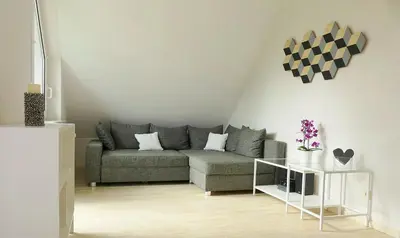 Ein Sitzbereich in der Unterkunft Ferienwohnung auf der Moselhöhe - Nähe Koblenz und Cochem