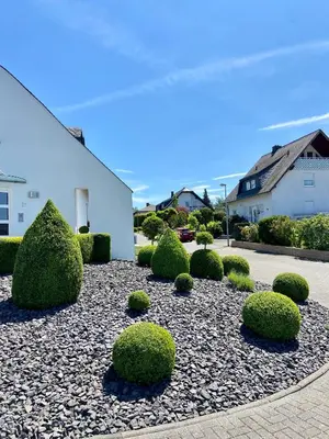 Ein Garten an der Unterkunft Ferienwohnung auf der Moselhöhe - Nähe Koblenz und Cochem