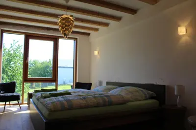 Ein Bett oder Betten in einem Zimmer der Unterkunft FeWo Freis in Brauneberg