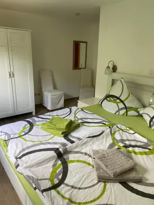 Ein Bett oder Betten in einem Zimmer der Unterkunft Ferienhaus Mausberg