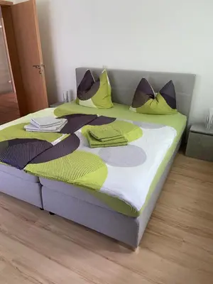 Ein Bett oder Betten in einem Zimmer der Unterkunft Ferienhaus Mausberg