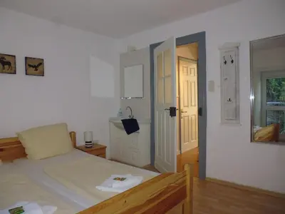 Ein Bett oder Betten in einem Zimmer der Unterkunft Mosel Ferienhaus Zell