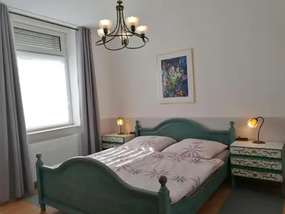 Ein Bett oder Betten in einem Zimmer der Unterkunft Kaiserliches Postamt Cobern