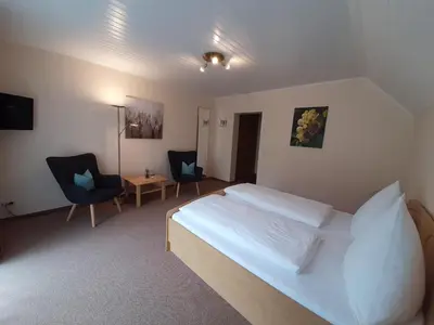 Ein Bett oder Betten in einem Zimmer der Unterkunft Haus Weingarten APPARTEMENTS-ZIMMER