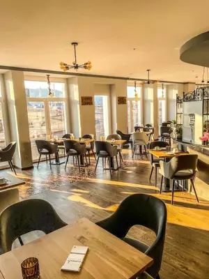 Ein Restaurant oder anderes Speiselokal in der Unterkunft Moselhaus Weiskopf `SelfCheckIn`OffSiteBreakfast`CityParking`
