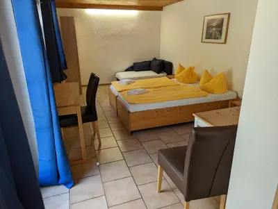 Ein Bett oder Betten in einem Zimmer der Unterkunft Hotel Pension Winzerhaus