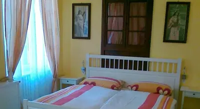 Ein Bett oder Betten in einem Zimmer der Unterkunft Gästehaus zum Moseltal
