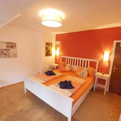 Ein Bett oder Betten in einem Zimmer der Unterkunft Wohnen über den Dächern der Cochemer Altstadt