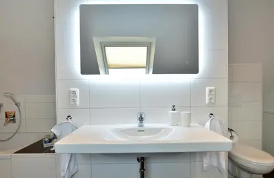 Ein Badezimmer in der Unterkunft Moselhof Ferienwohnungen