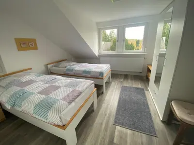 Ein Bett oder Betten in einem Zimmer der Unterkunft Apartment Ehrenbreitstein