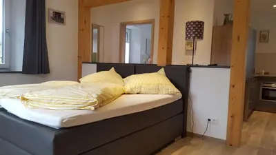 Ein Bett oder Betten in einem Zimmer der Unterkunft Beim Hooch 