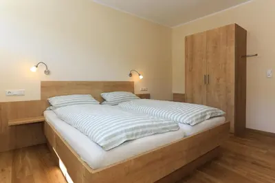 Ein Bett oder Betten in einem Zimmer der Unterkunft Ferienweingut Pies Ellenz-Poltersdorf