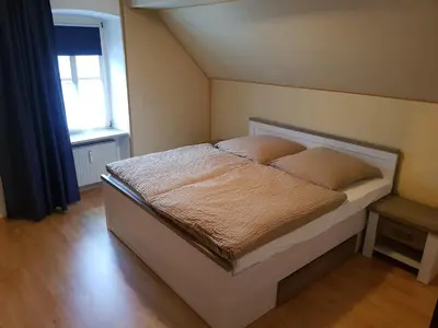 Ein Bett oder Betten in einem Zimmer der Unterkunft Ferienwohnung Liebeskummer