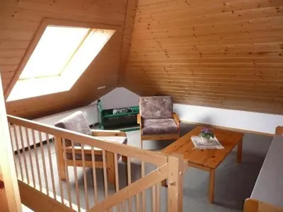Ein Sitzbereich in der Unterkunft Nationalpark-Gastgeber Eifel