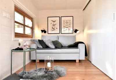 Ein Sitzbereich in der Unterkunft Tiny House Dreischwesternherz