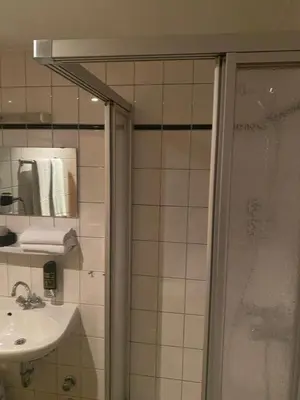 Ein Badezimmer in der Unterkunft Hotel Restaurant Frankenturm
