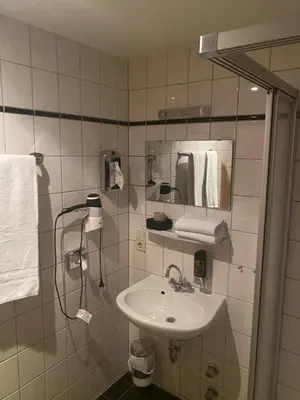 Ein Badezimmer in der Unterkunft Hotel Restaurant Frankenturm