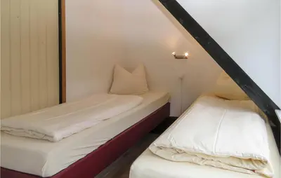 Ein Bett oder Betten in einem Zimmer der Unterkunft Beautiful Home In Gerolstein With Wifi