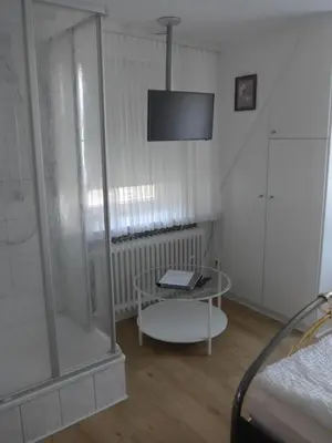 Ein Bett oder Betten in einem Zimmer der Unterkunft Pension Schneider