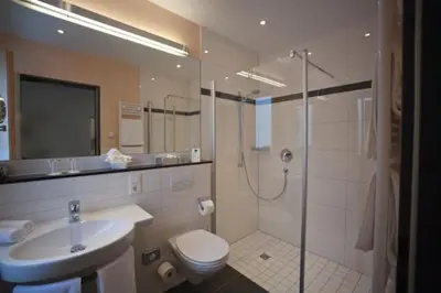 Ein Badezimmer in der Unterkunft Weingut & Gästehaus Schmitz-Bergweiler