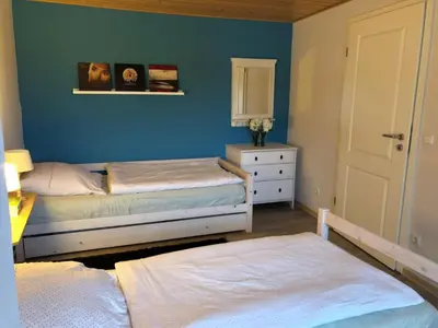 Ein Bett oder Betten in einem Zimmer der Unterkunft BelEtage Eifel