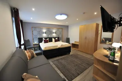 Ein Bett oder Betten in einem Zimmer der Unterkunft Hotel-Restaurant Ehses
