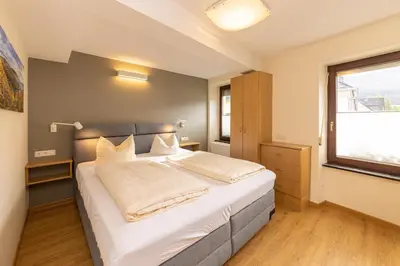 Ein Bett oder Betten in einem Zimmer der Unterkunft Hotel-Restaurant Ehses
