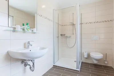 Ein Badezimmer in der Unterkunft Gasthaus am Brunnen