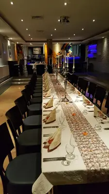 Ein Restaurant oder anderes Speiselokal in der Unterkunft Hotel Weinhaus Weis