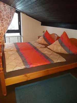 Ein Bett oder Betten in einem Zimmer der Unterkunft Ferienhaus Ammermann